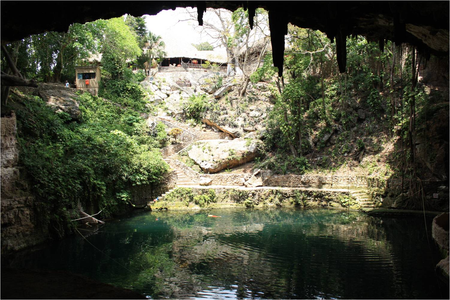 Peaceful Cenote Zaci in the middle of town