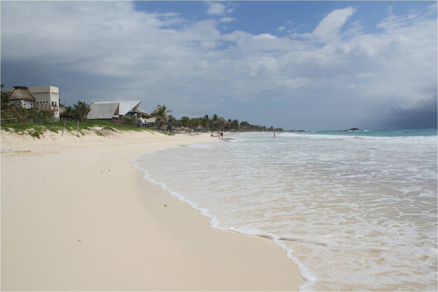 Small hotels at the white sandy beach of Tulum...